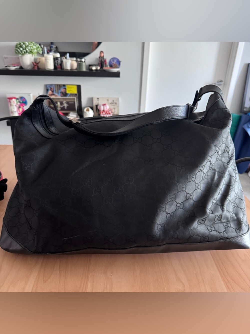 Gucci Black Leather Logo-Stamped Handbag